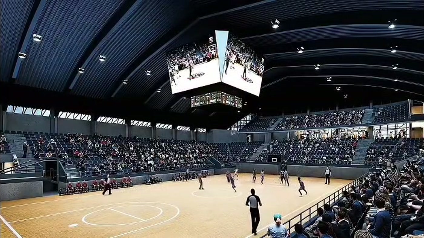 Interior de la arena deportiva con graderías