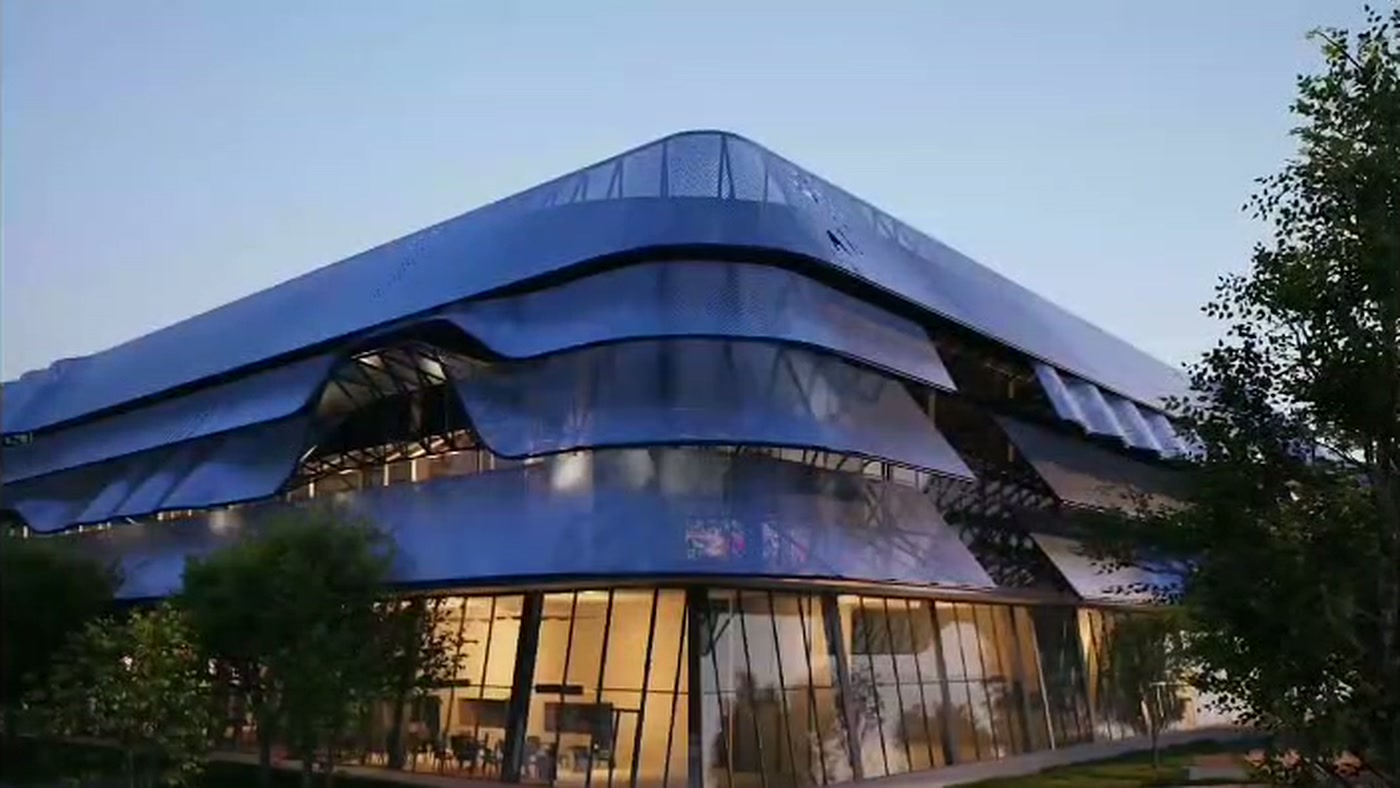 Exterior del complejo deportivo al atardecer